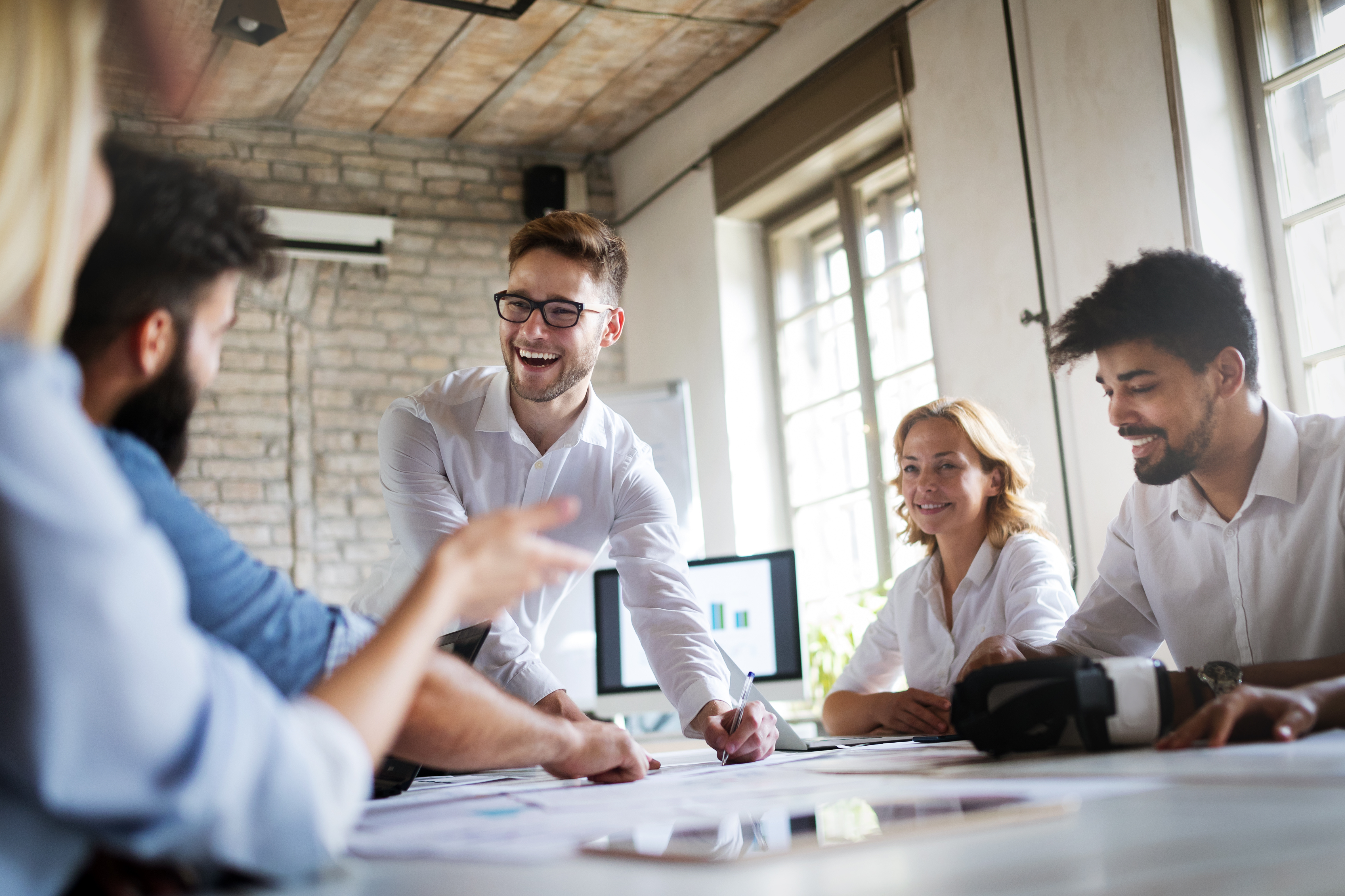 People sharing ideas in an office.